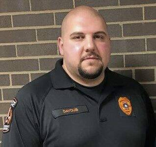 Derek Dayoub in a police uniform